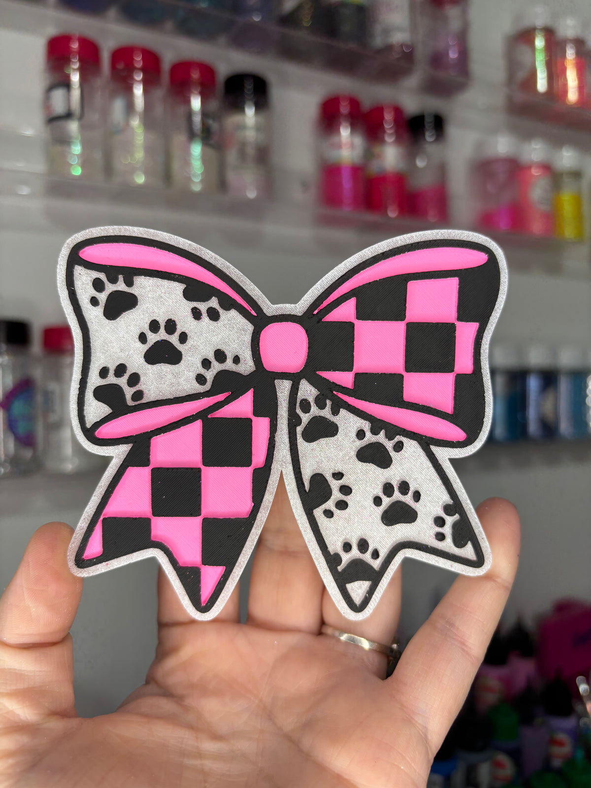 Checkered paw bow